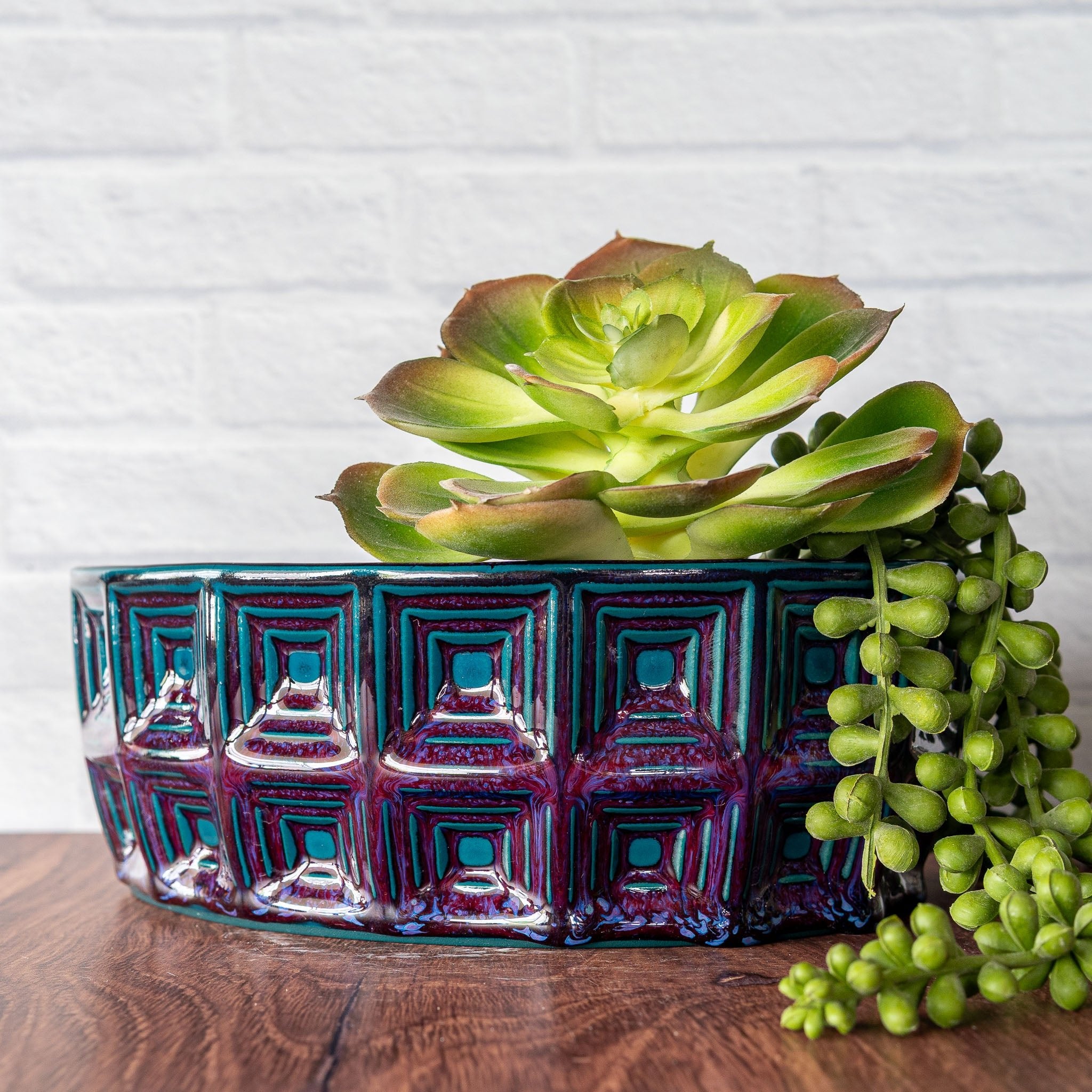 Hammerly Ceramics handmade slip-cast planter in glossy deep crimson and teal, oval with concentric recessed squares
