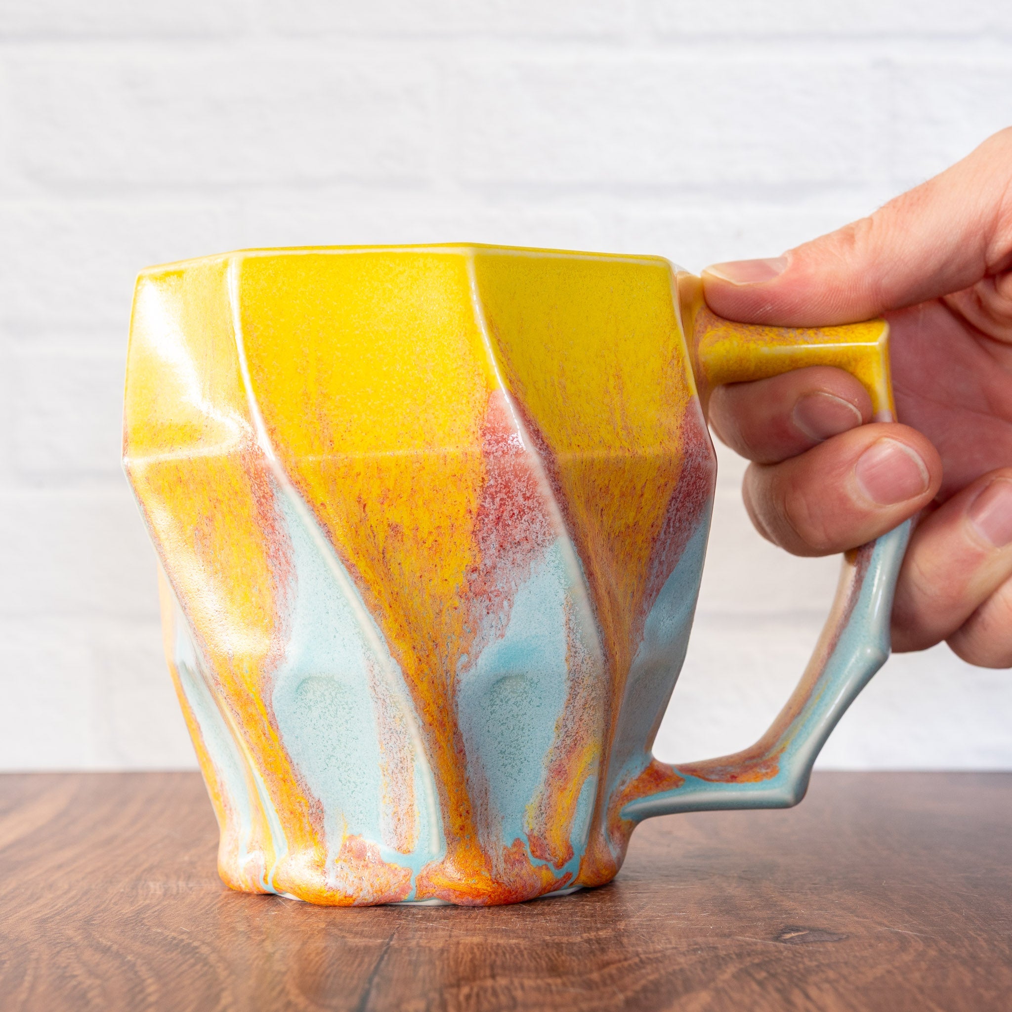 Hammerly Ceramics handmade slip-cast Classic Mug inyellow and sky blue with flowing orange blush, faceted porcelain with angular handle