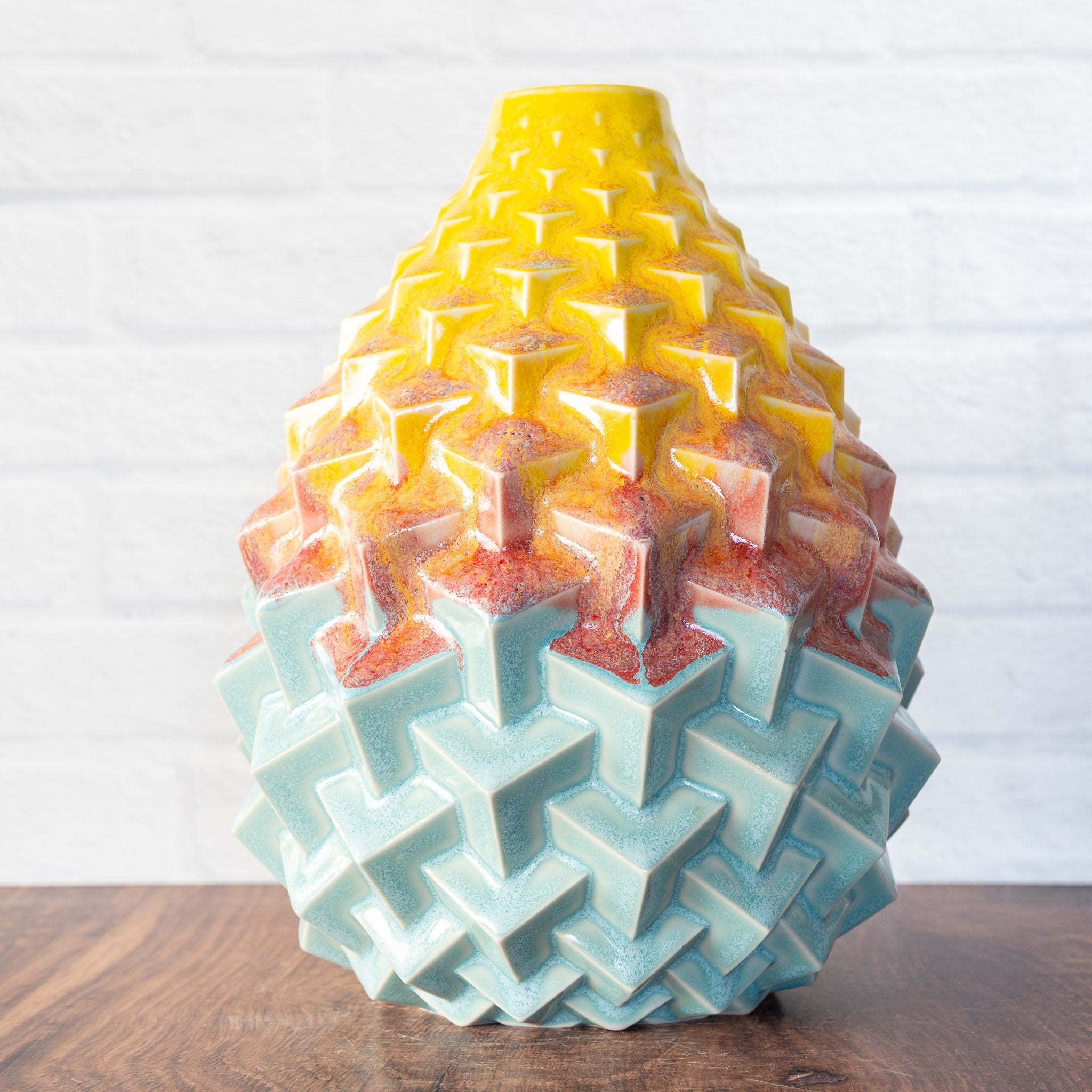 Hammerly Ceramics handmade slip-cast Stacked Cubes Vase in yellow and sky blue with flowing orange blush, geometric textured porcelain