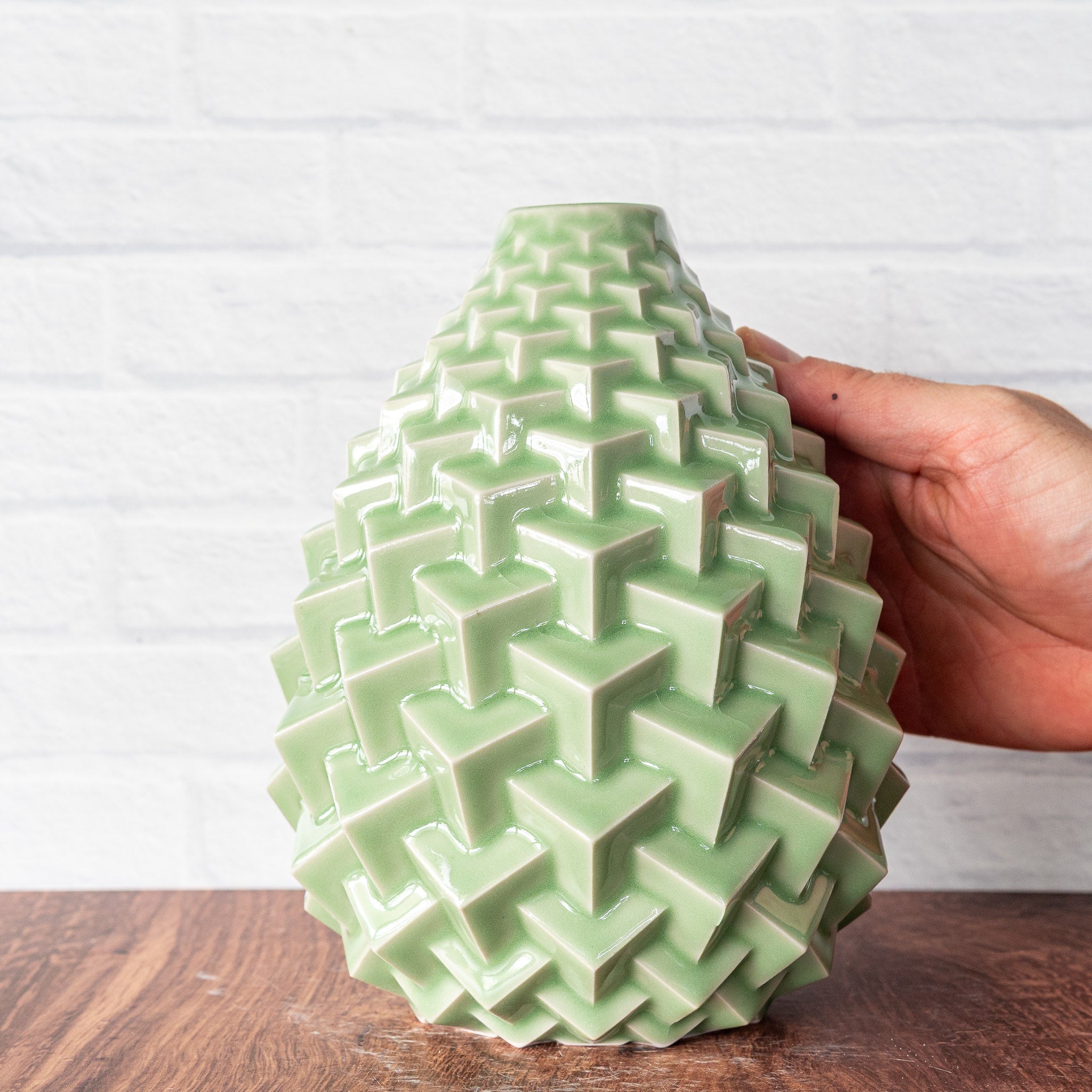 Hammerly Ceramics handmade slip-cast Stacked Cubes Vase in glossy, translucent green celadon glaze, geometric textured porcelain