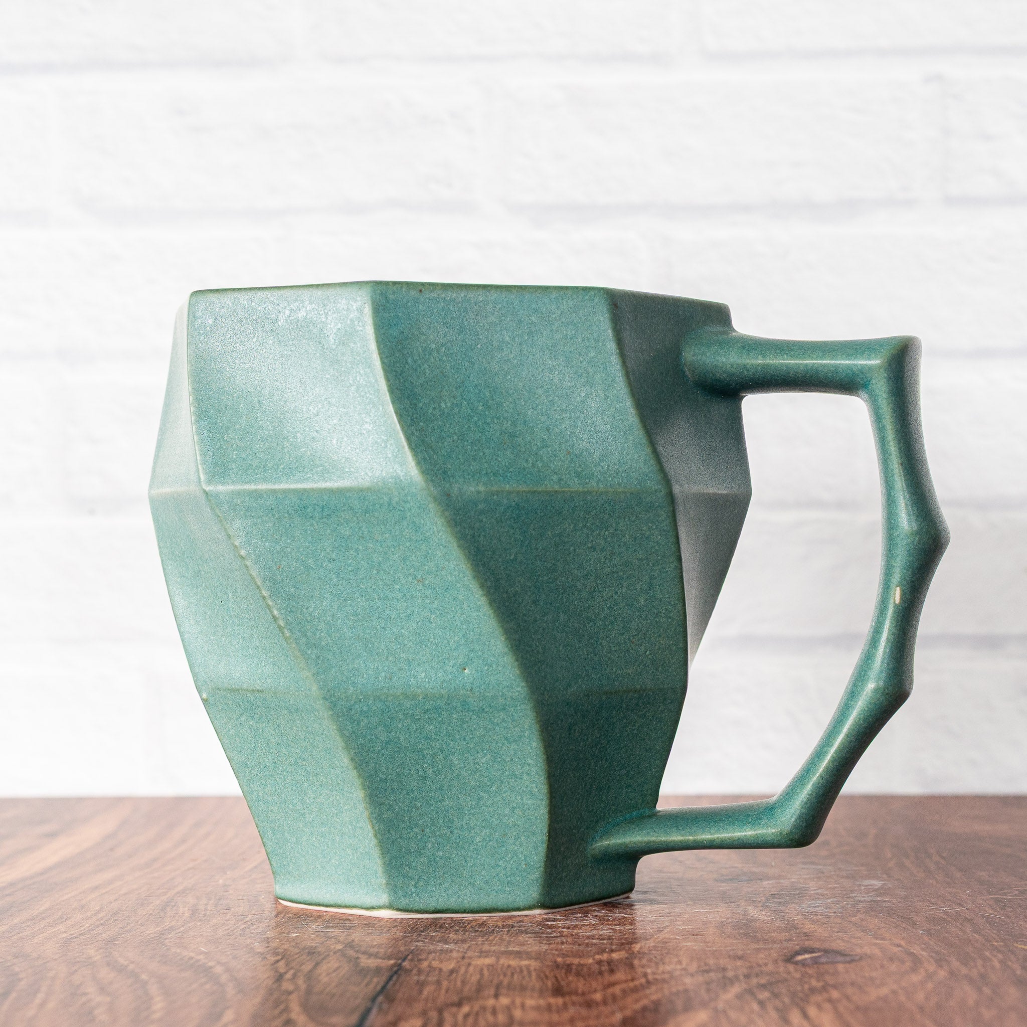 Hammerly Ceramics Classic Mug in smooth, matte jade green glaze, faceted porcelain with angular handle