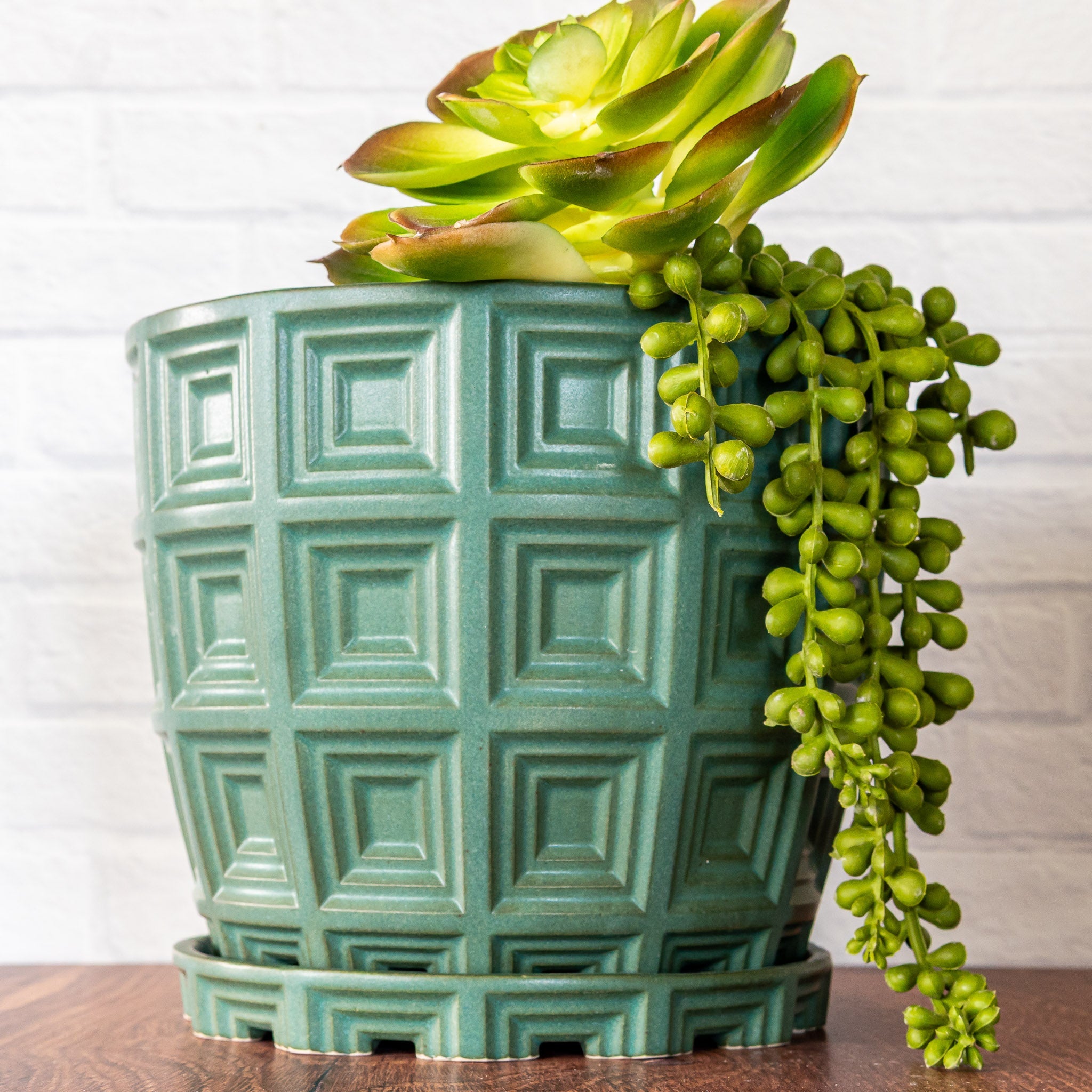 Hammerly Ceramics handmade slip-cast planter in smooth, matte jade green, barrel-shaped with concentric recessed squares