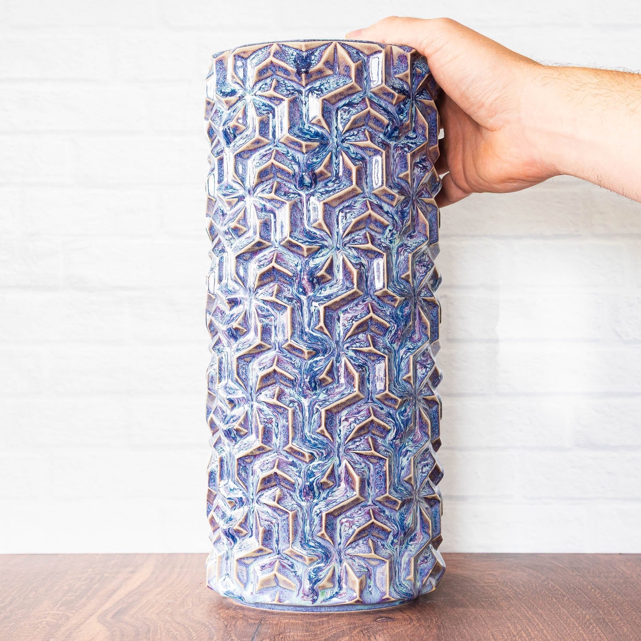 Hammerly Ceramics handmade slip-cast vase in swirls of various shades of blue , interlocking geometric weave textured porcelain