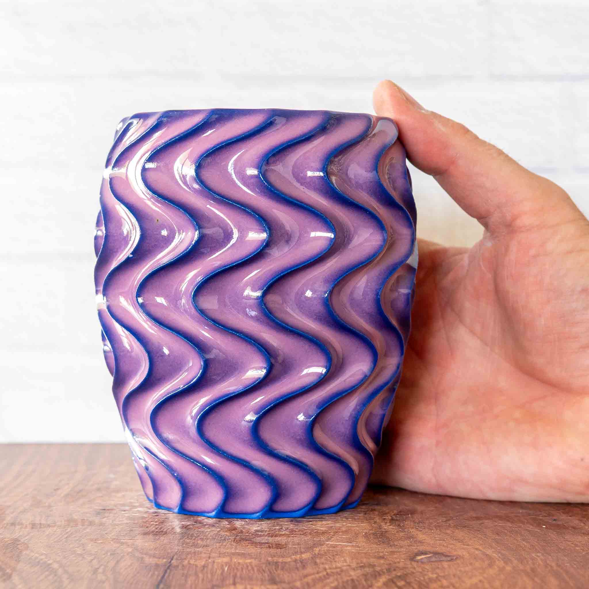 Hammerly Ceramics handmade slip-cast cup in violet over dark blue purple edges, deep wavy textured porcelain