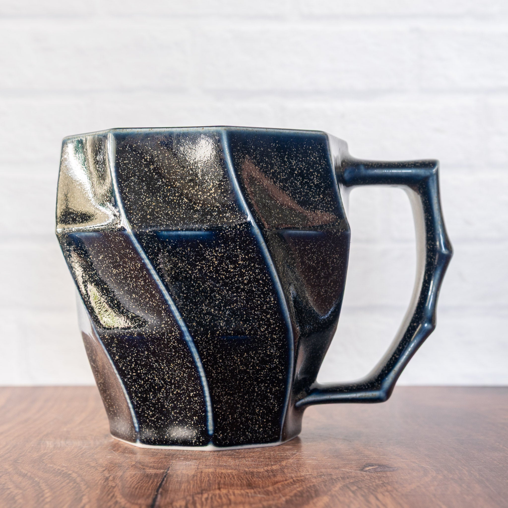 Hammerly Ceramics Classic Mug in deep navy glaze with gold speckle glossy glaze, faceted porcelain with angular handle