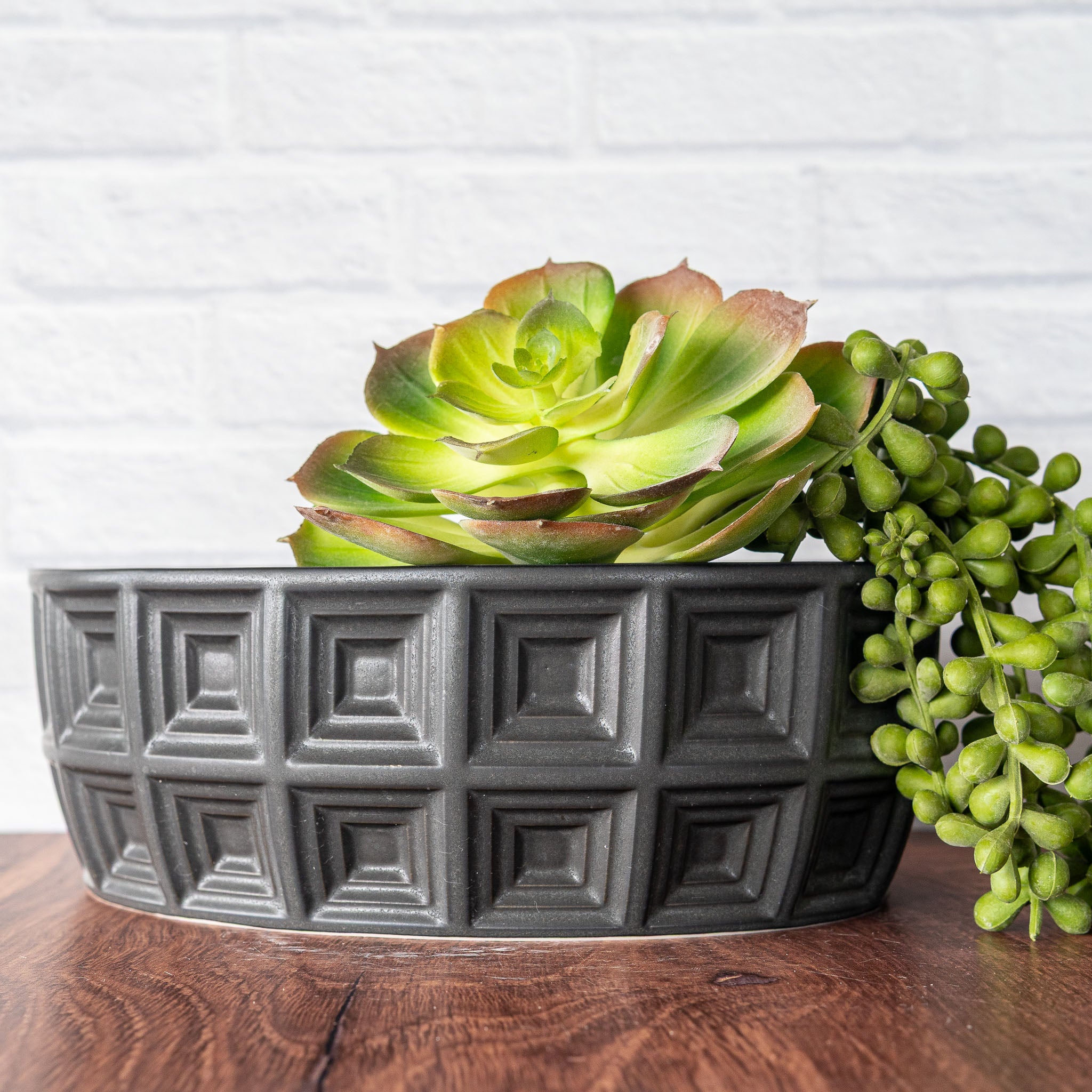 Hammerly Ceramics handmade slip-cast planter in smooth, matte black, oval with concentric recessed squares 