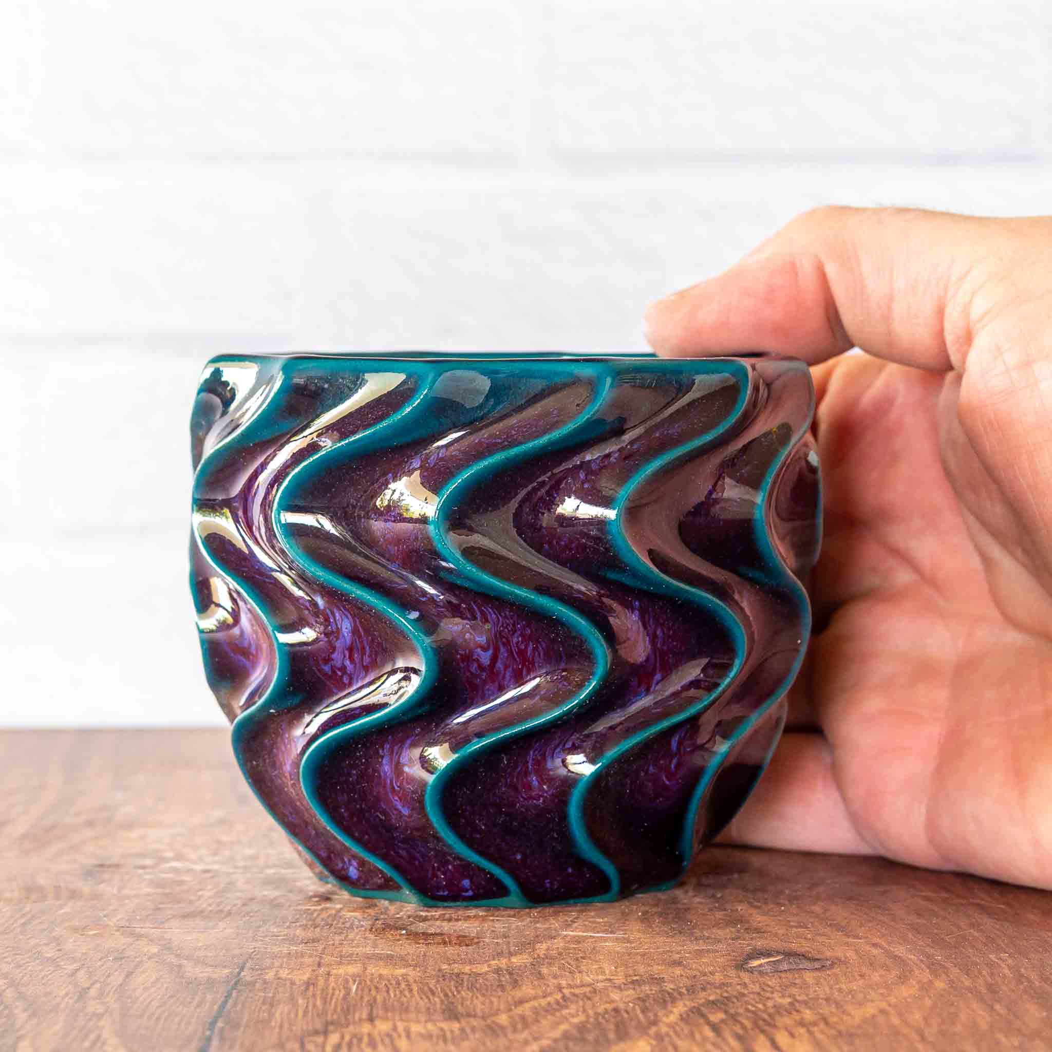 Hammerly Ceramics handmade slip-cast cup in glossy deep crimson and teal, deep wavy textured porcelain 
