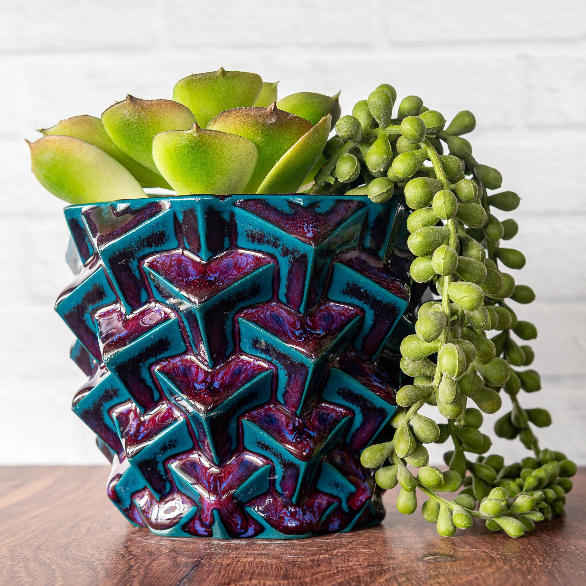 Hammerly Ceramics handmade slip-cast planter in glossy deep crimson and teal, geometric cubes textured porcelain