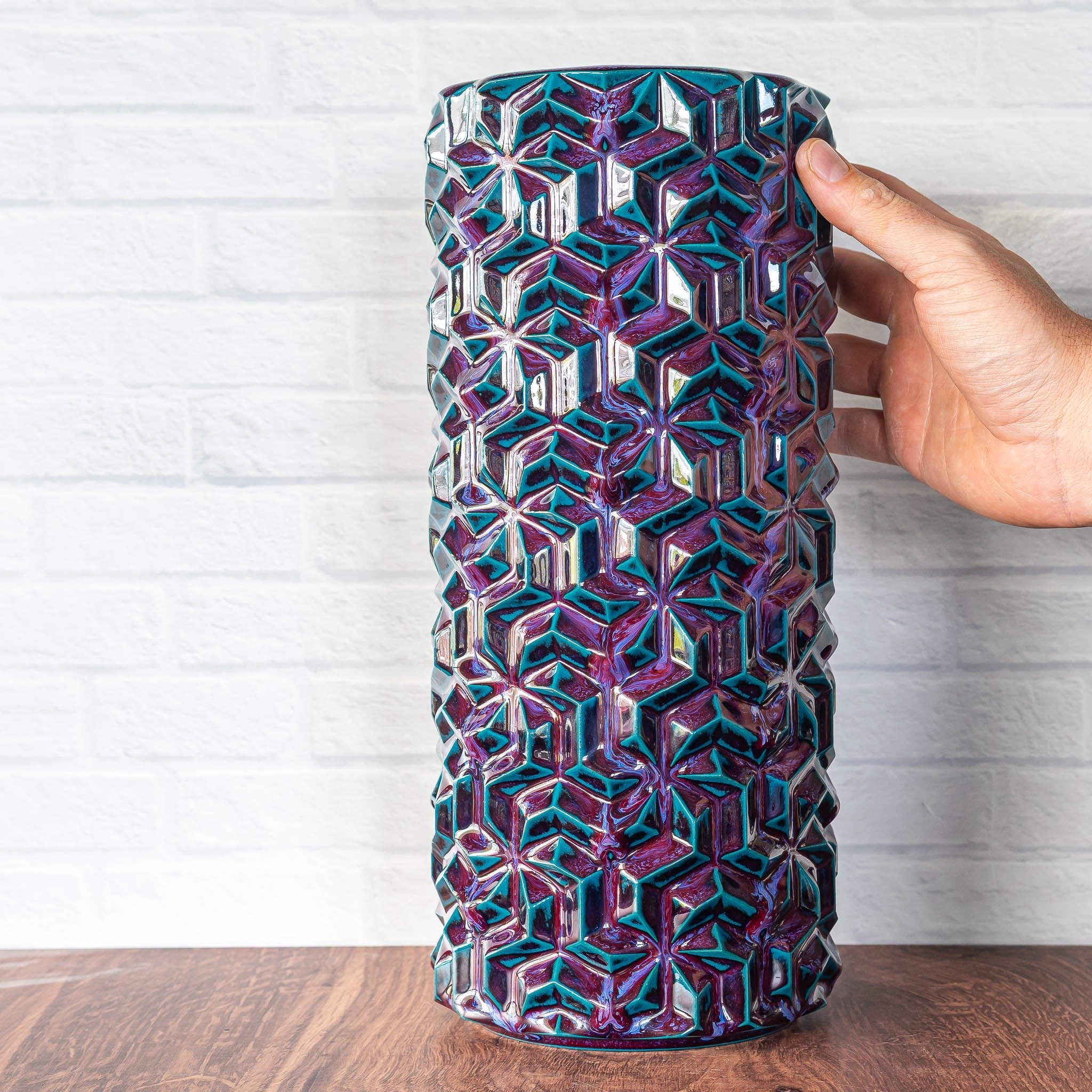 Hammerly Ceramics handmade slip-cast vase in glossy deep crimson and teal , interlocking geometric weave textured porcelain