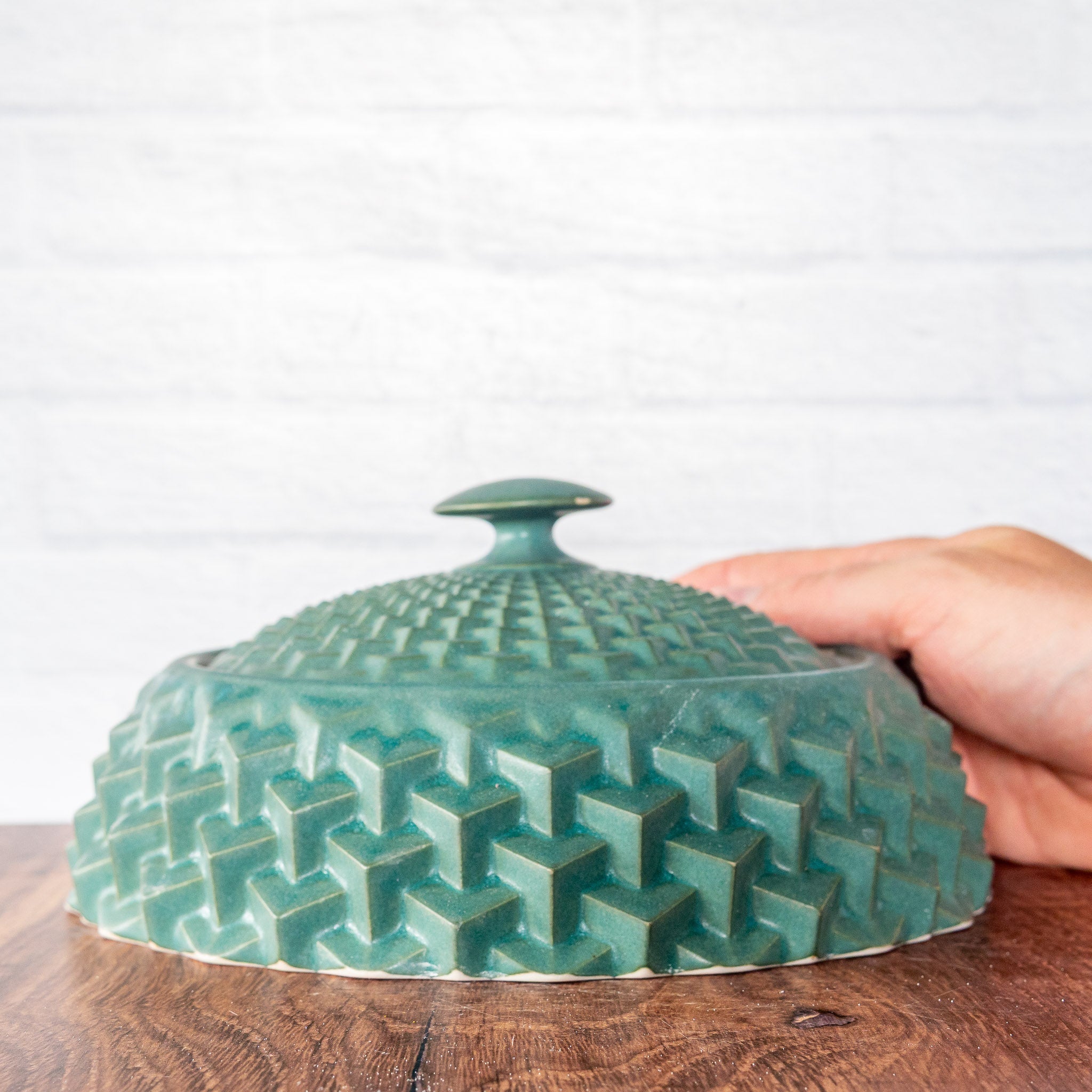 Hammerly Ceramics handmade slip-cast lidded jar in smooth, matte jade green, geometric cubes textured porcelain