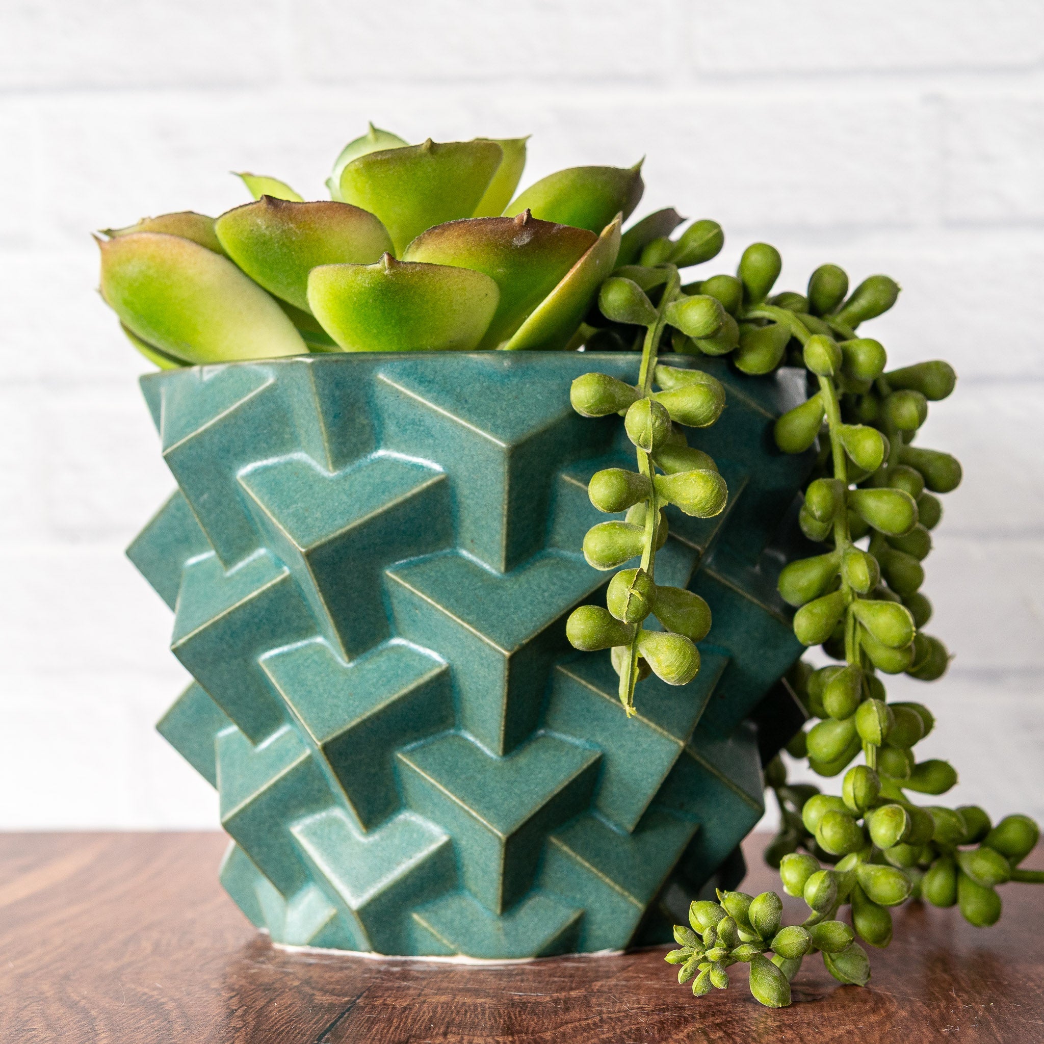 Hammerly Ceramics handmade slip-cast planter in smooth, matte jade green, geometric cubes textured porcelain