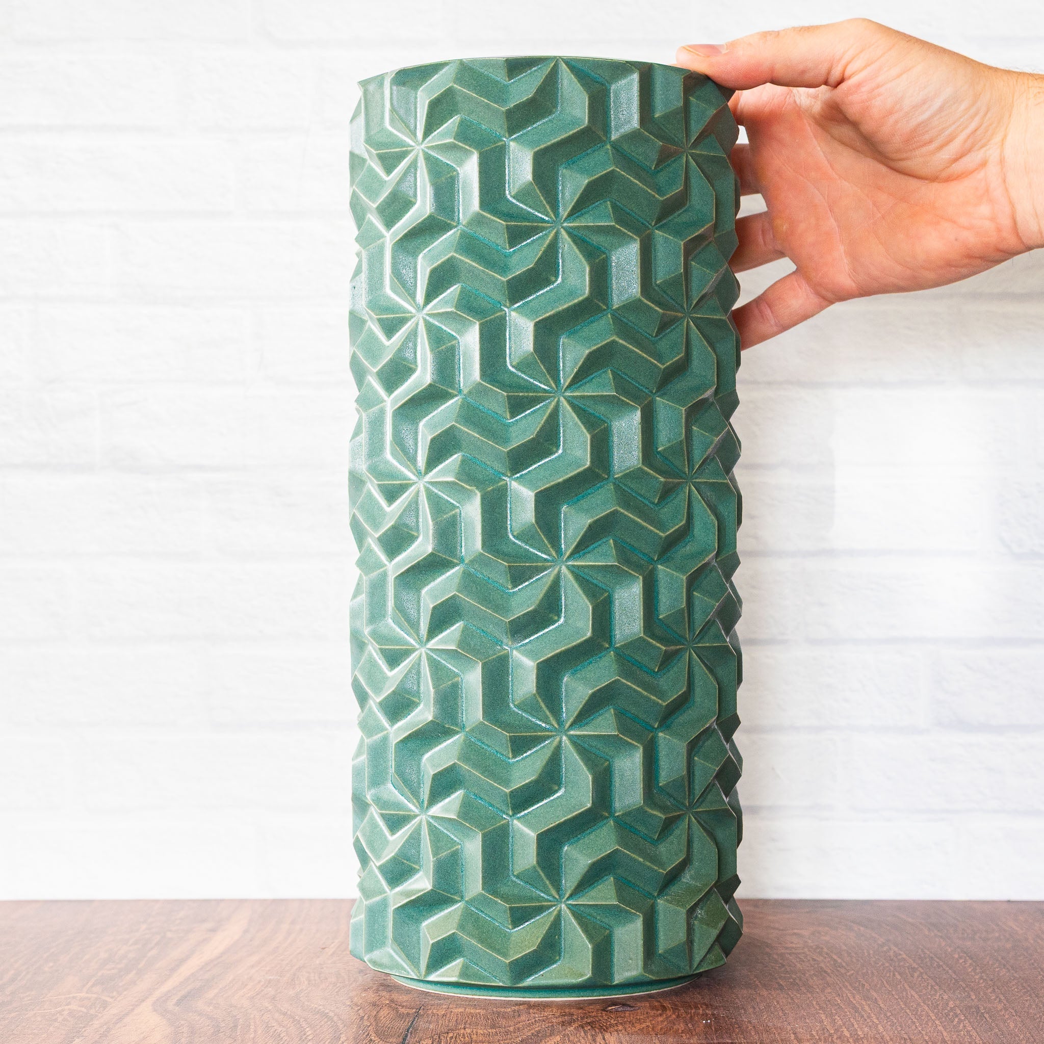 Hammerly Ceramics handmade slip-cast vase in smooth, matte jade green , interlocking geometric weave textured porcelain