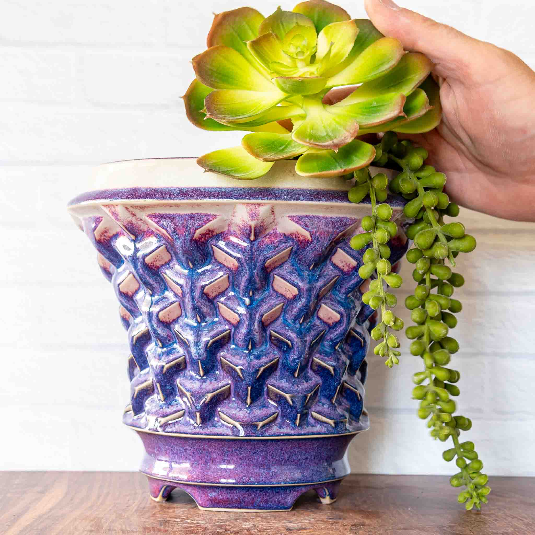 Hammerly Ceramics handmade slip-cast planter in white and deep navy glaze with purple drip transition, geometric repeating truncated cubes texture
