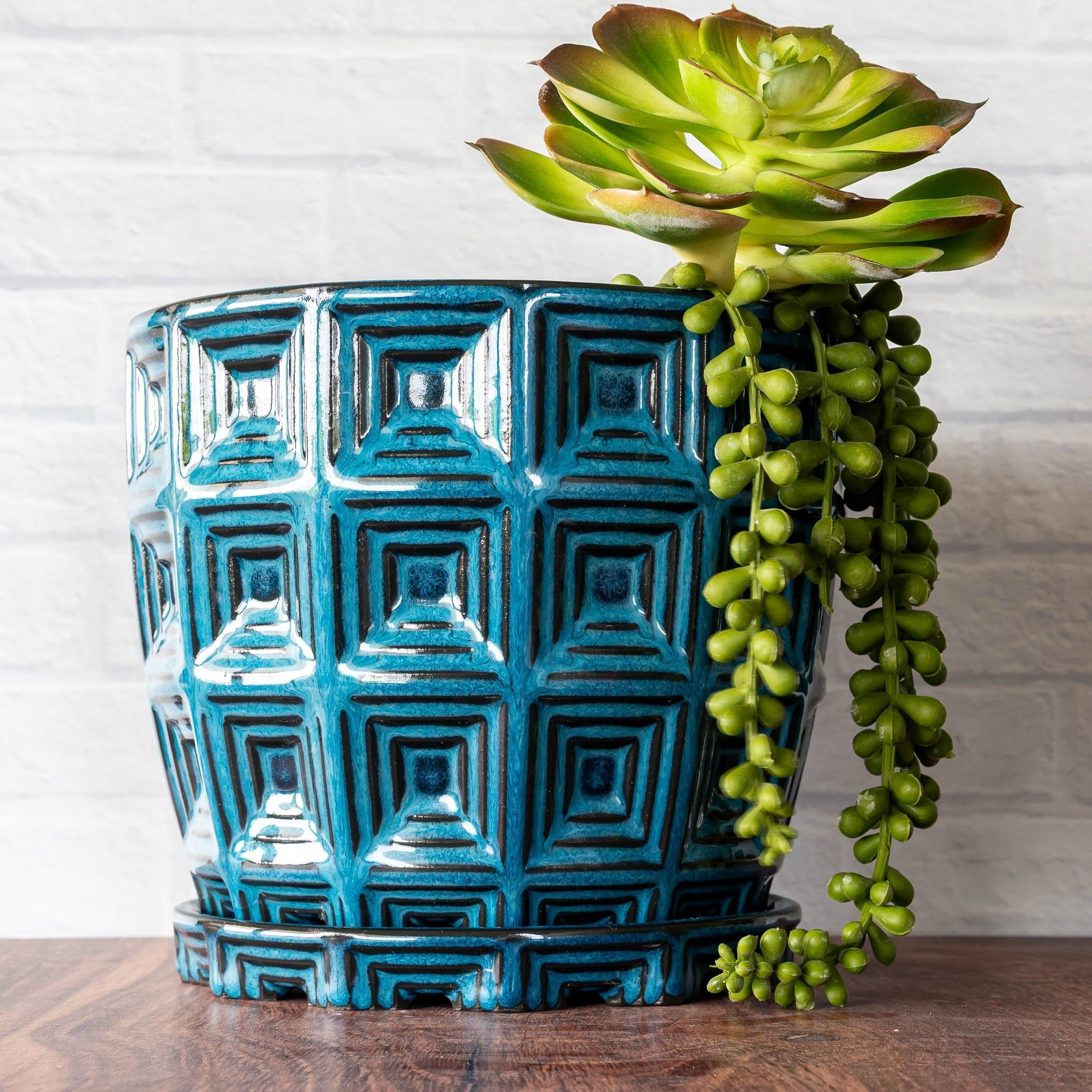 Hammerly Ceramics handmade slip-cast planter in ocean blue glaze with dark charcoal edges, barrel-shaped with concentric recessed squares 